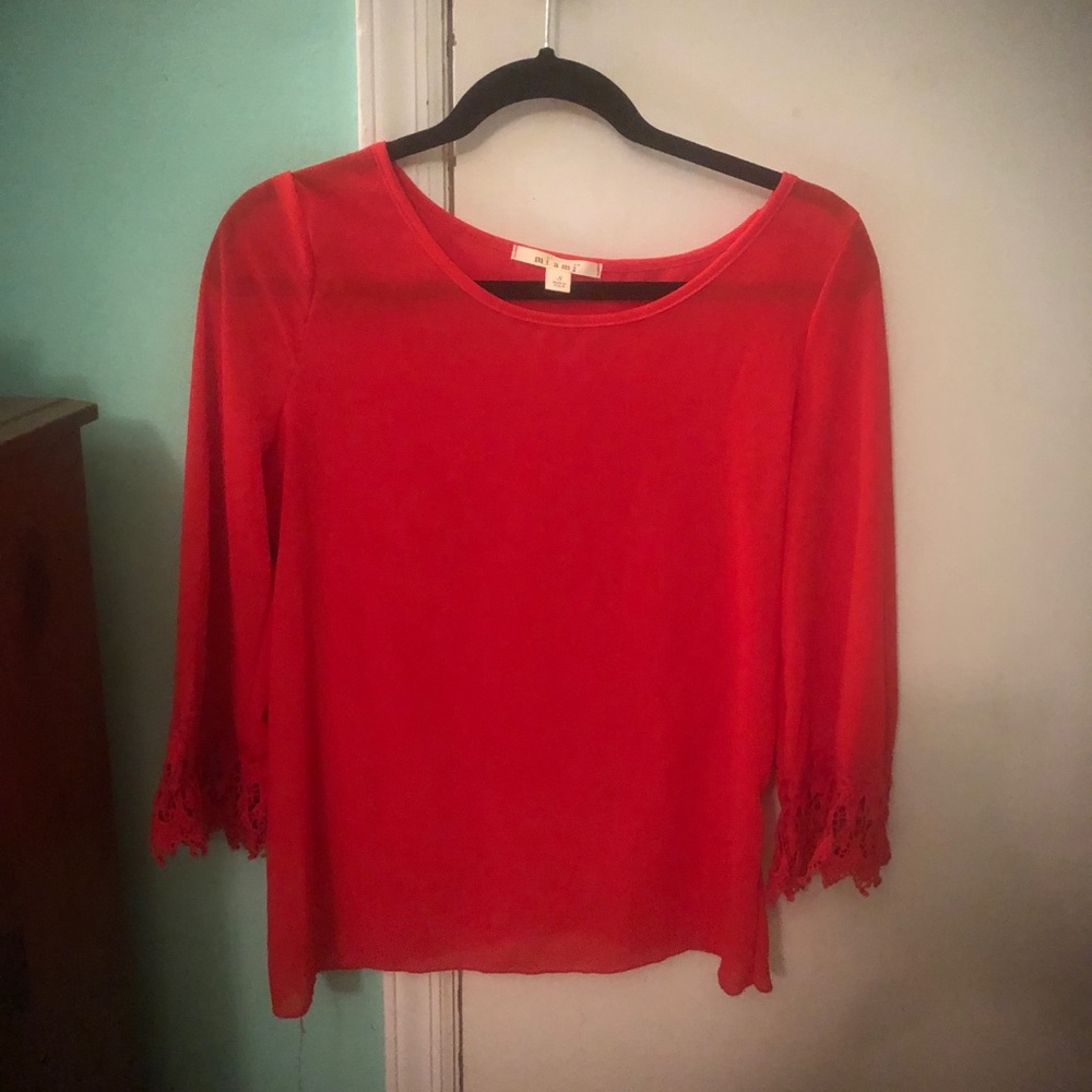Red/coral blouse!